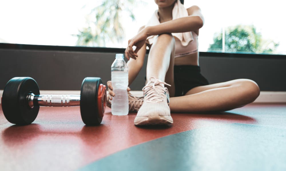 Mujer entrenando thể dục